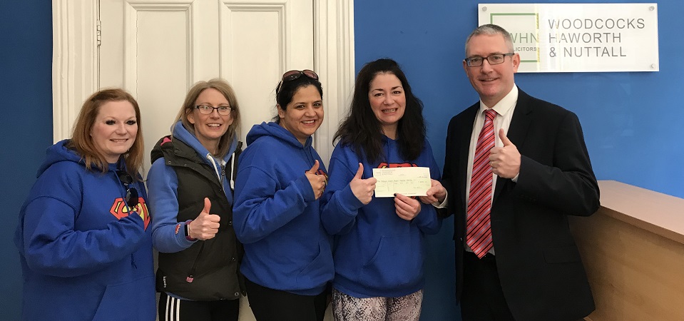 The Joshua Wilson Brain Tumour Charity accepts cheque from WHNs 2018 charity quiz event