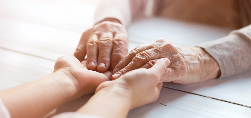 Young hands holding old hands