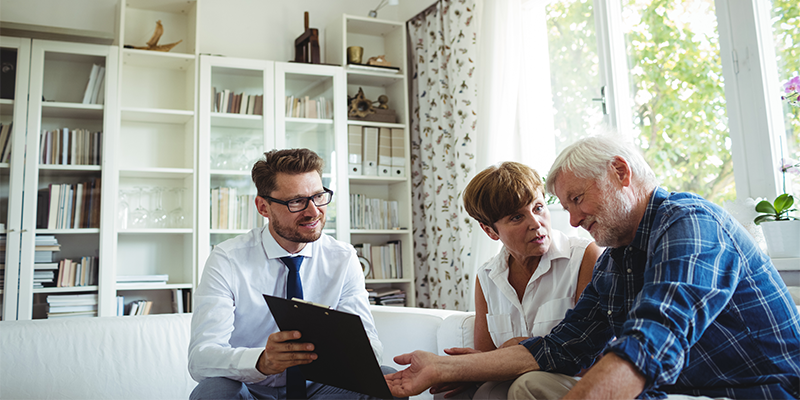 wo-older-people-talking-solicitor-what-you-should-never-put-in-your-will-uk-blog-image