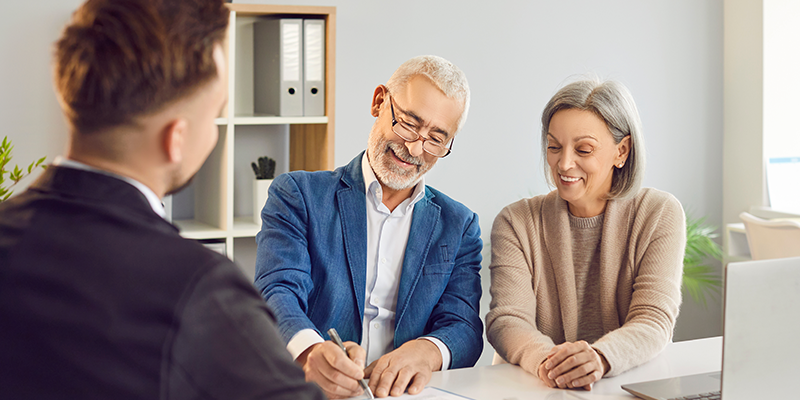 elderly-couple-meeting-with-solicitor-how-are-retirement-plans-divided-in-divorce