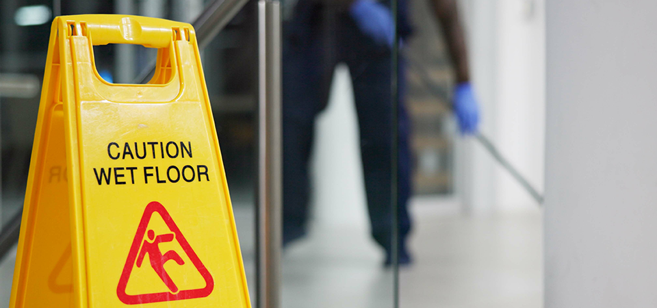wet-floor-sign-accidents-in-the-workplace-compensation-FEATURED-IMAGE