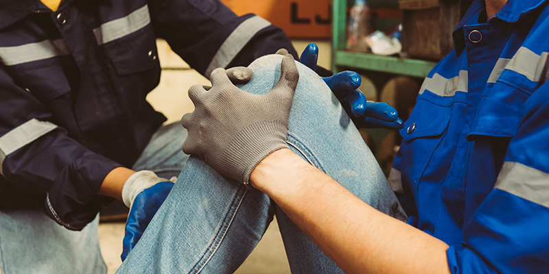 man-with-injury-being-treated-workplace-injury-accident